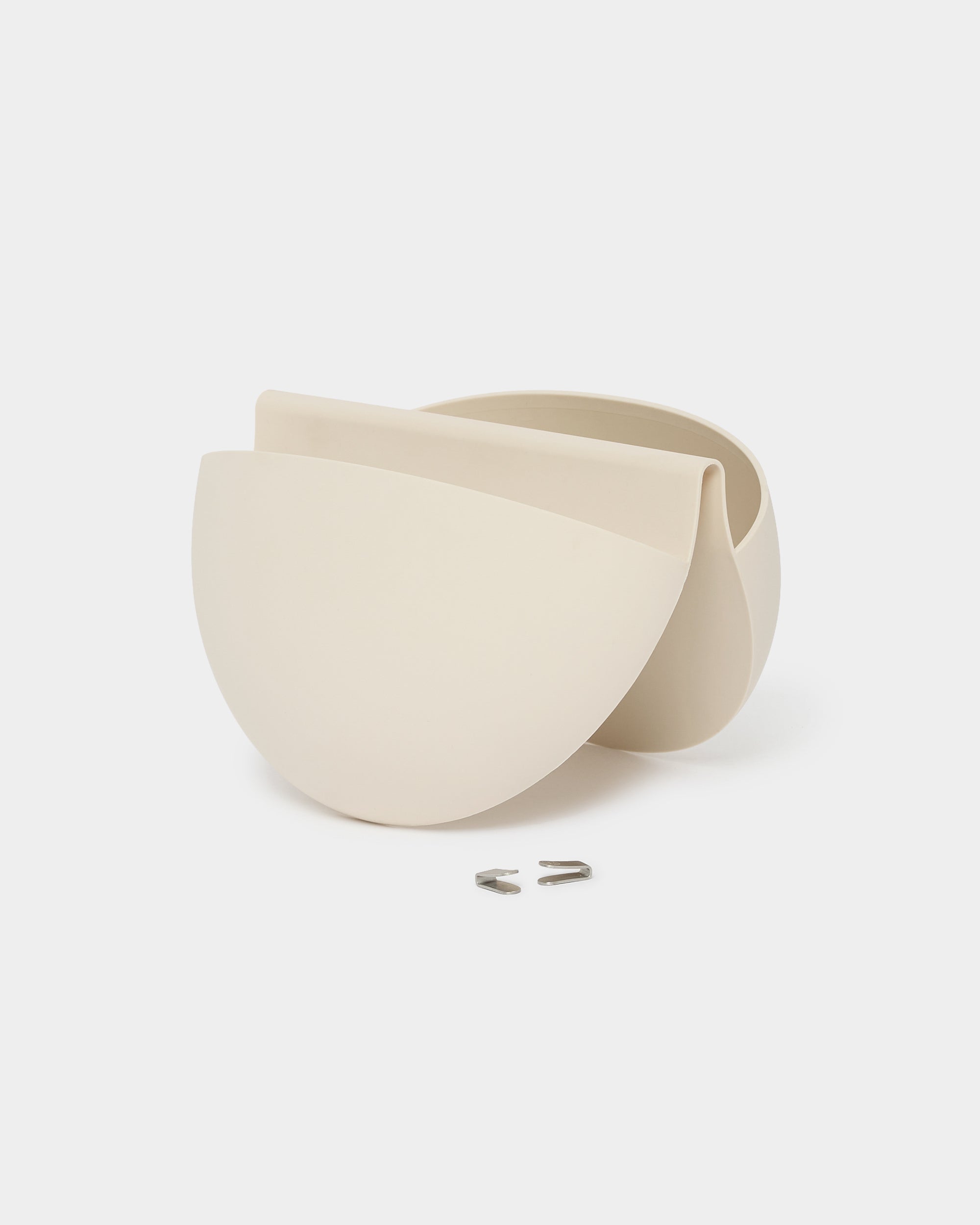 Gro | Soft Pocket / BM2 by WoodUpp is a light beige, semi-circular 4 l wall planter with modern design and reusable TPV planting pocket, compatible with Akupanel.
